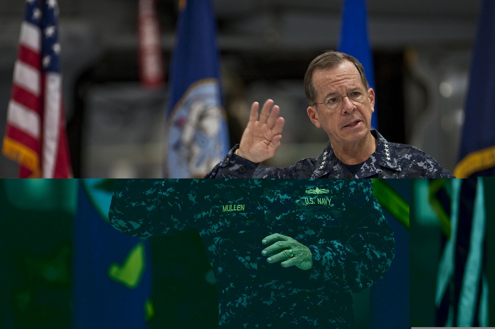 CJCS Navy Adm. Mike Mullen presents pararescuemen with bronze stars