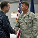 CJCS Navy Adm. Mike Mullen presents pararescuemen with bronze stars
