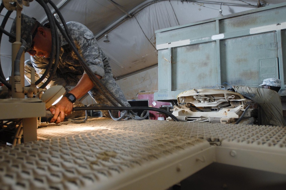 Motors, manuals and motivation: B Field Maintenance Company molds Soldiers into mechanics, mechanics into leaders