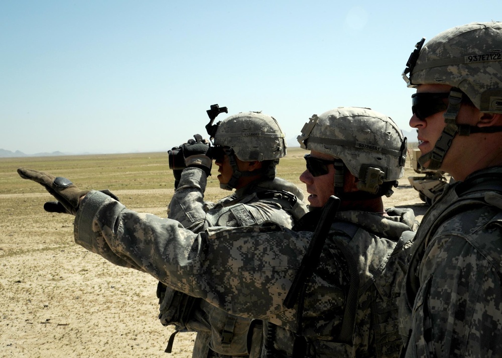 US Soldiers familiarize themselves with their weapons before missions.