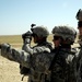 US Soldiers familiarize themselves with their weapons before missions.