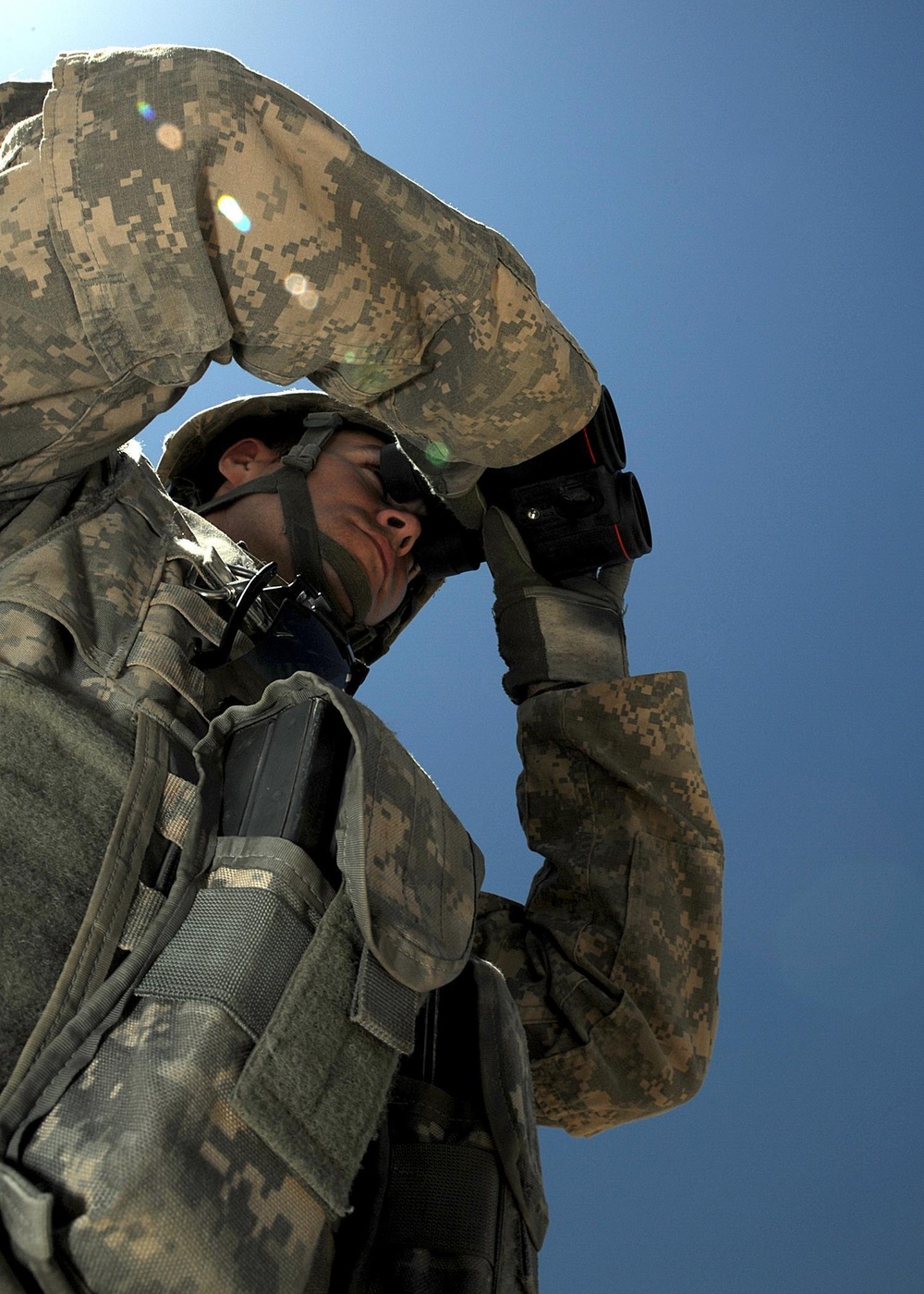 US Soldiers familiarize themselves with their weapons before missions.