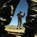 US Soldiers familiarize themselves with their weapons before missions.