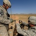 US Soldiers familiarize themselves with their weapons before missions.