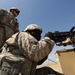 US Soldiers familiarize themselves with their weapons before missions.