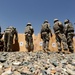 US Soldiers familiarize themselves with their weapons before missions.