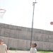 Soldiers shoot hoops in Ghormach