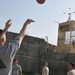 Soldiers shoot hoops in Ghormach