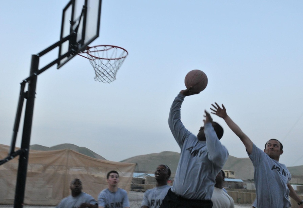 Soldiers shoot hoops in Ghormach