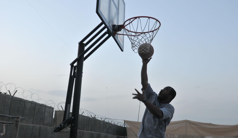 Soldiers shoot hoops in Ghormach