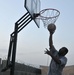 Soldiers shoot hoops in Ghormach