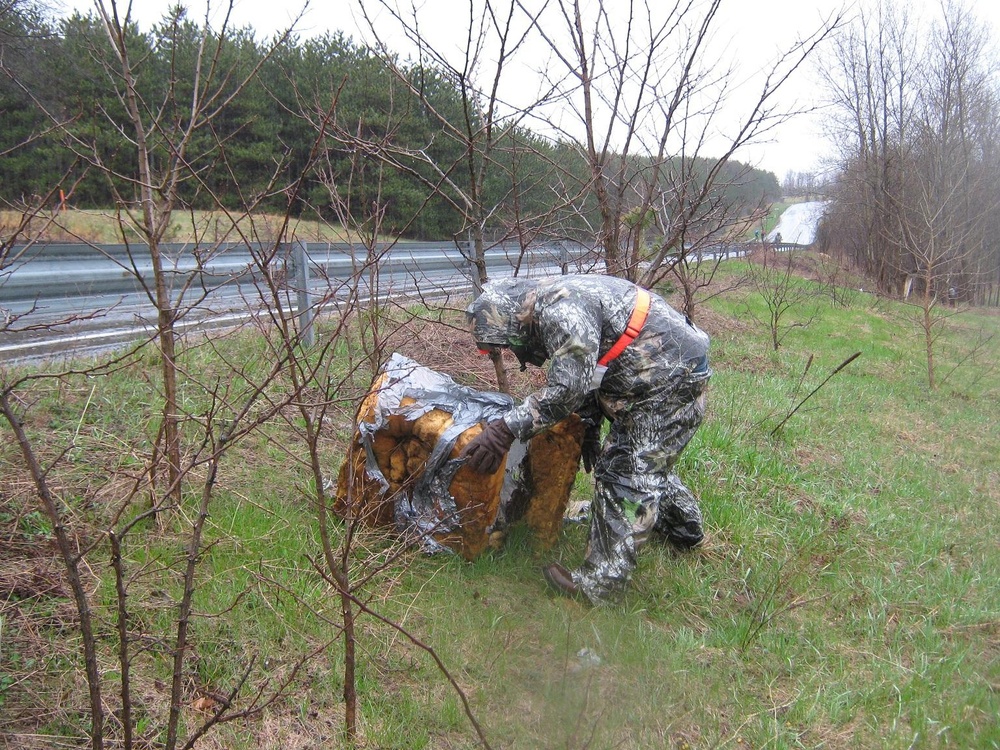 Air National Guard volunteers clean local highway as part of clean and green initiative