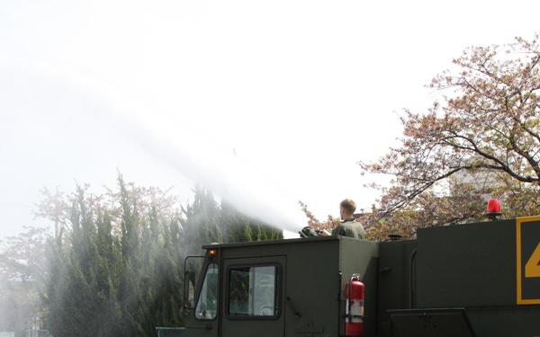 ARFF Marines teach students: Matthew C. Perry students learn ins, outs of aircraft firefighting