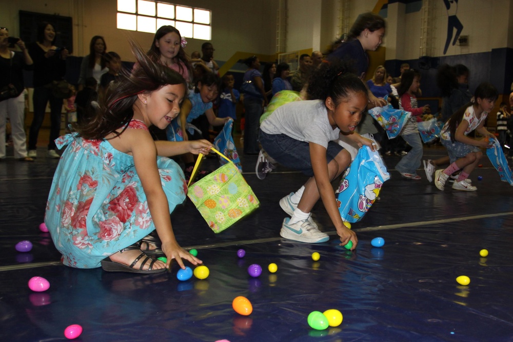 Children nab, bag colorful candy-filled eggs