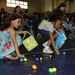 Children nab, bag colorful candy-filled eggs