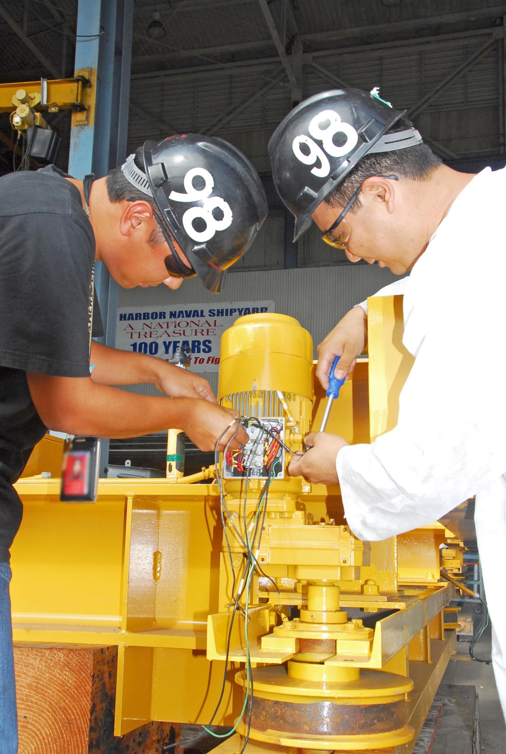 PHNSY electrical apprentices check crane motor