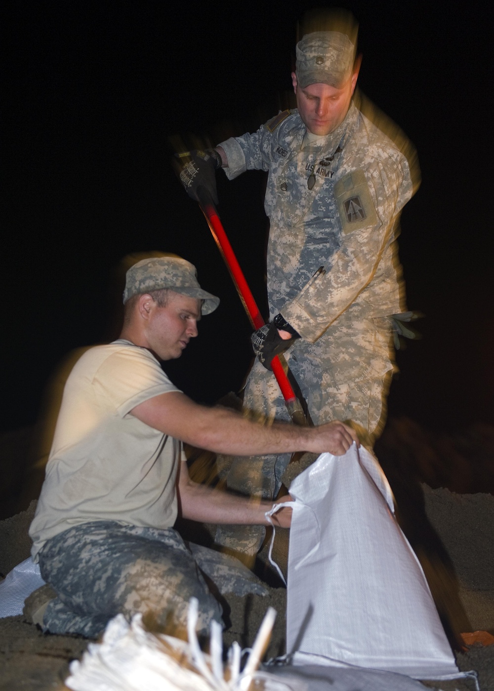 Indiana National Guard soldiers work through night toward 100,000 sandbags goal