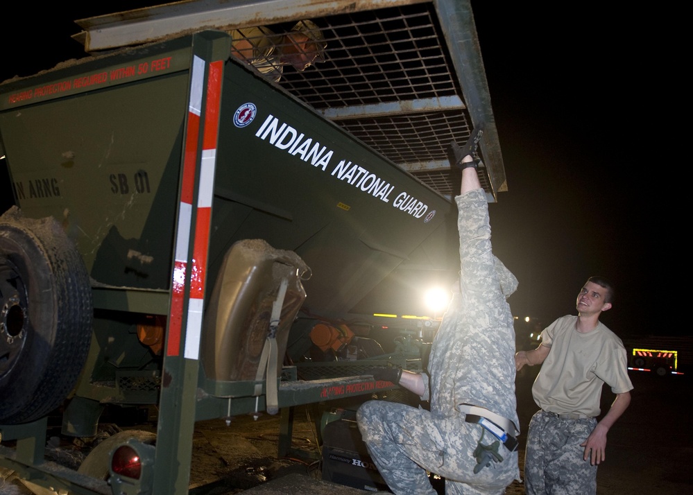 Indiana National Guard soldiers work through night toward 100,000 sandbags goal
