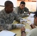 Iraqi Police Review Evidence During Training Exercise