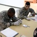 Iraqi Police Review Evidence During Training Exercise