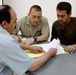 Iraqi Police Review Evidence During Training Exercise