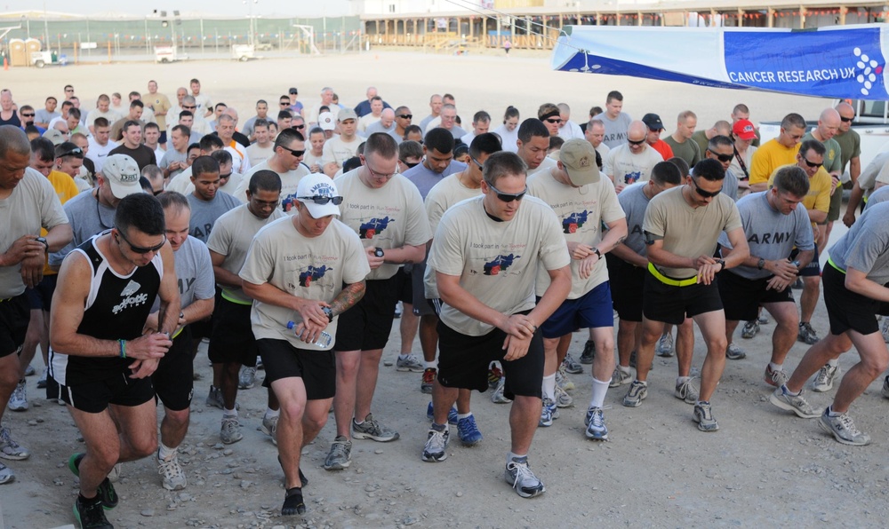 Going bald for UK cancer research at Kandahar Airfield, Afghanistan