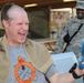 Going bald for UK cancer research at Kandahar Airfield, Afghanistan