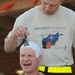 Going bald for UK cancer research at Kandahar Airfield, Afghanistan