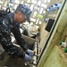 Sailor takes water sample in Vanuatu