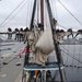 USS Constitution sailors unfurl and furl a sail