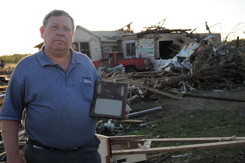 Tornado survivor unearths cherished momento
