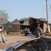 Soldier, inmates observe devastated surroundings