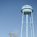 City water tower wears remnants of recent storm