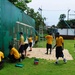 Sailors and Marines play football with children in Thailand