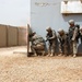 Engineers and infantrymen train together on how to secure a compound at Camp Taji, Iraq