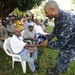 Pacific Partnership commander meets oldest man in Hog Harbor