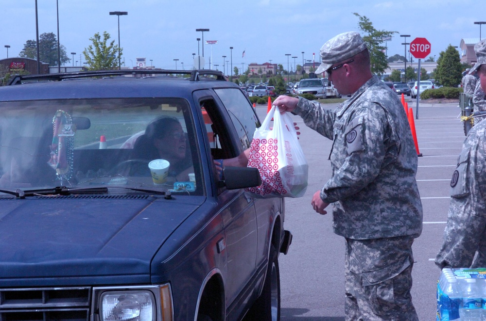 Alabama National Guard distributes aid after tornados.
