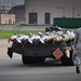 Bombs away: Airmen work together to build, load munitions