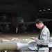 Bombs away: Airmen work together to build, load munitions