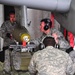 Bombs away: Airmen work together to build, load munitions