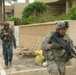 ‘First Lightning’ Battalion soldiers conduct a combined patrol with 1st Iraqi Federal Police partners