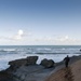 A Seabee participating African Lion walks the beach