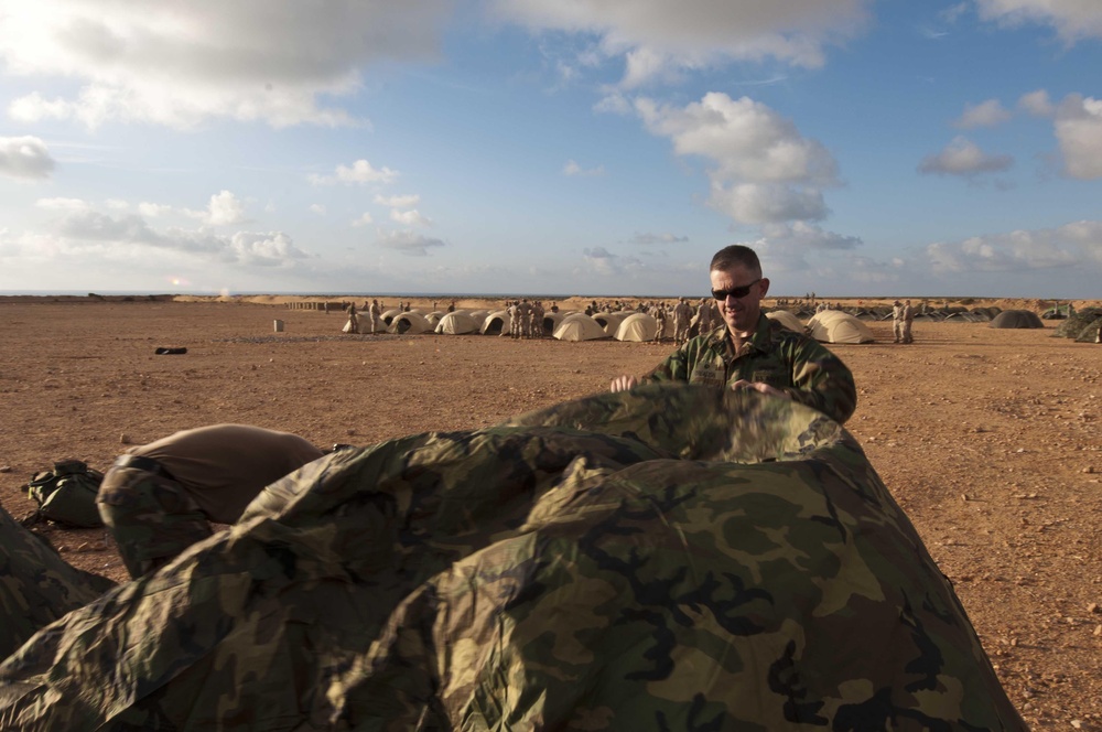 Servicemember prepares for rain