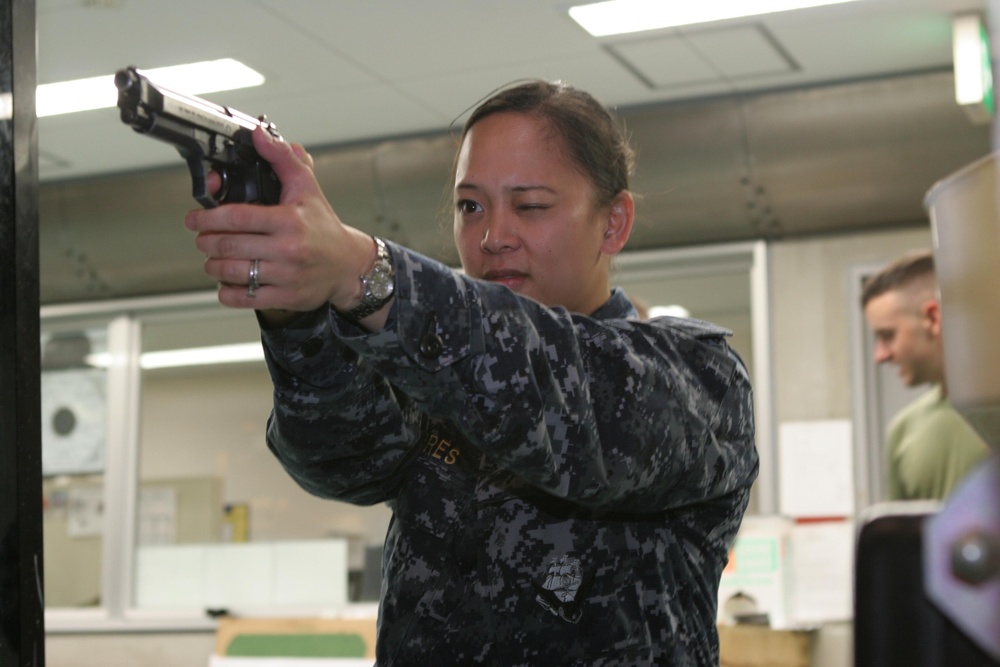 Pistol qualification prepares sailors for overseas deployments, combat readiness