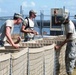 Louisiana Guard rushes to protect city from flood waters