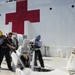 USNS Comfort's anchor gets washed down