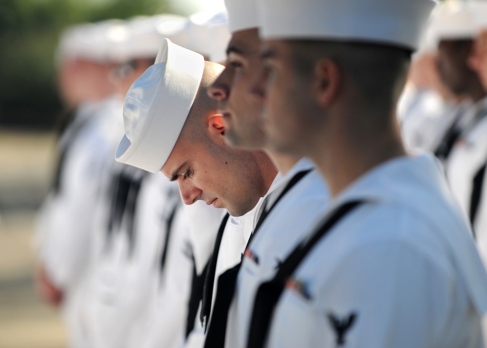 Sailor does last-minute uniform check