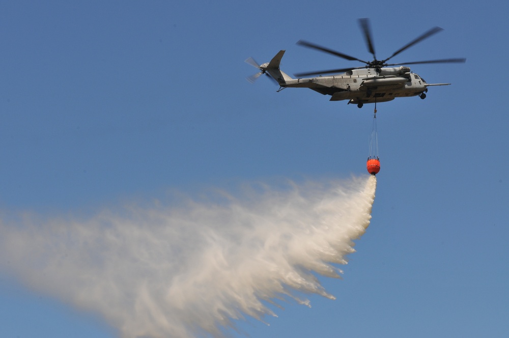 Helicopter drops water during exercise