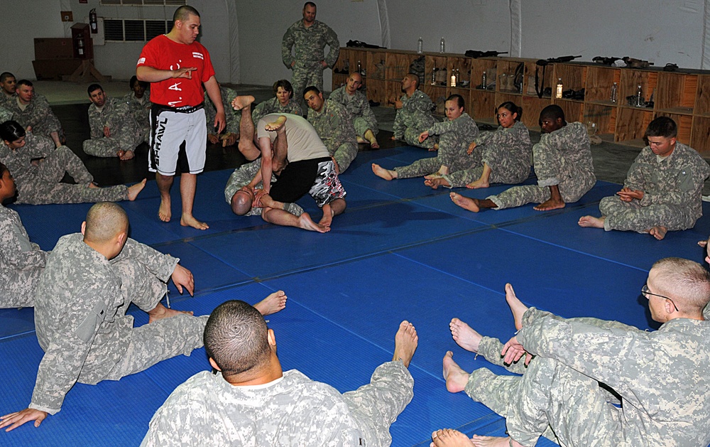 Wranglers challenge each other in combatives class