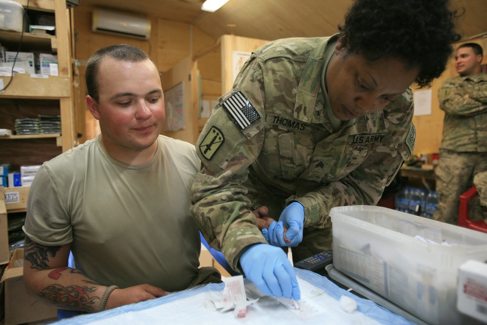 Medics run tests during a training exercise